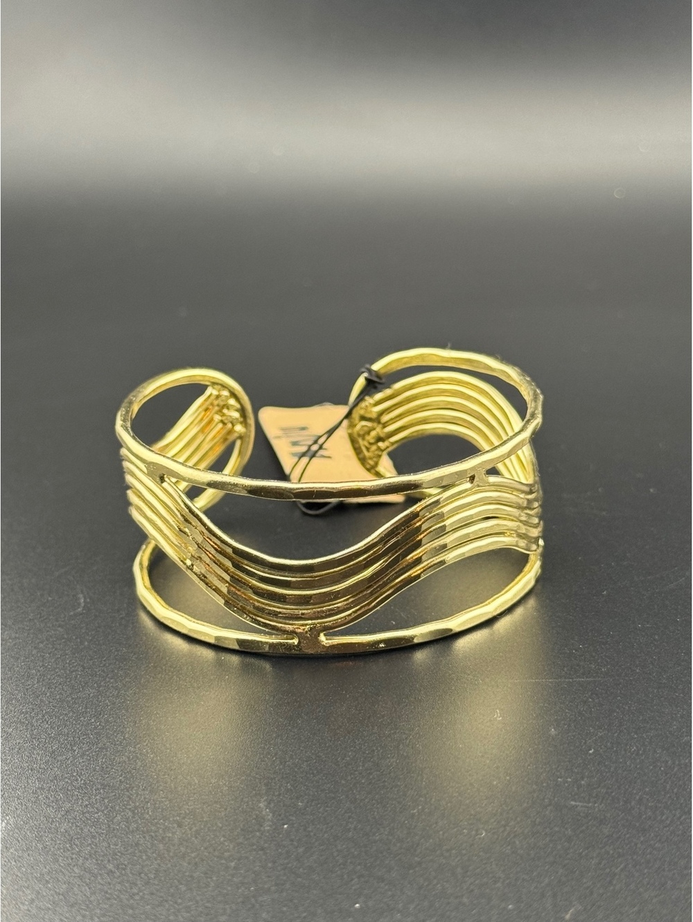 Gold Tone Open Cuff Bracelet with Wave Design